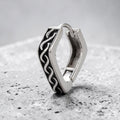 Silver ring with wavy design 